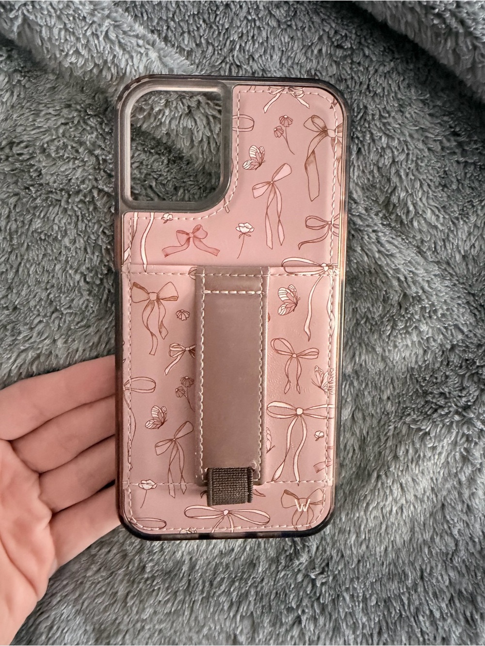 iPhone 16 plus Pink Floral Bow Strap Phone Case with Built-In Hand Loop
